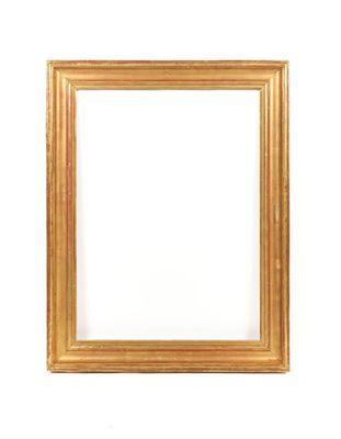 a gold frame on a white wall with a white background