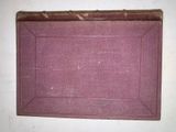 a picture of an old suitcase with a pink cover
