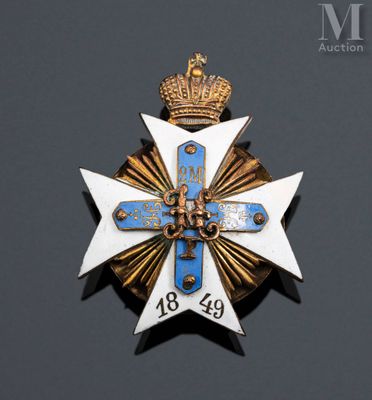 a close up of a cross with a crown on top of it