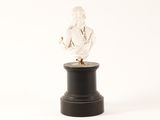a statue of a man on a pedestal on a white background