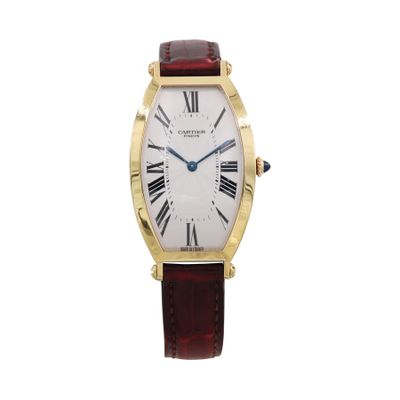 a close up of a wrist watch with roman numerals on it