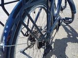 a bike that is parked on the side of the street