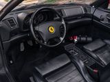 a black interior of a car with black leather seats
