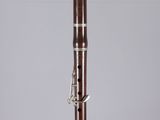 a close up of a clarinet in a clear case