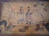 a picture of a painting on the wall of a room