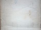 a piece of paper with writing on it sitting on a table