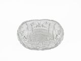 a clear glass bowl on a white surface