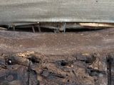 a close up of a tire with a hole in it