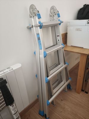 a ladder that is leaning against a wall in a room