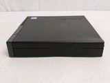 a close up of a dvd player sitting on a white surface