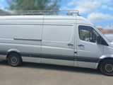 a white van that is parked in a parking lot