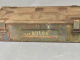 an old metal box with some writing on it