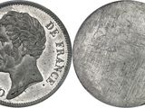a close up of a coin on a white background