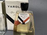 an image of a bottle of yardley cologne next to a box of perfume