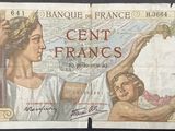 an old french bank note with a woman and child on it