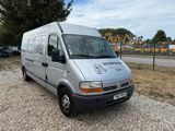 a silver van that is parked on the side of the road