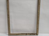 an old wooden picture frame with a white background and a white background