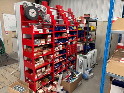 many boxes and boxes on the shelves in the warehouse