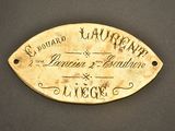brass plaque with the name of a man and woman on it