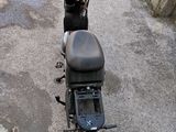a motorcycle that is parked on the side of the road