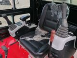 a picture of a tractor with a seat and a steering