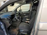 the interior of a van with the door open and the driver ' s seat down