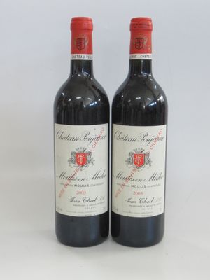 two bottles of red wine sitting next to each other on a table