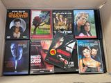 beaucoup de dvd dans une boîte sur la table