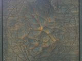 a painting on the wall of a building with a clock on it