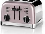 an image of a toaster with four slices of bread