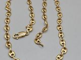 a gold chain necklace with links and a clasp