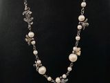 a close up of a necklace on a mannequin mannequin mannequin mannequin mannequin mannequin mannequin mannequin