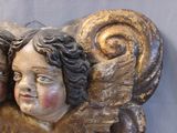 a statue of two children sitting next to each other