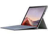 Un ordinateur portable Microsoft Surface et un Surface Book exposés sur un fond blanc