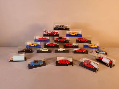 a lot of toy cars that are sitting on a table