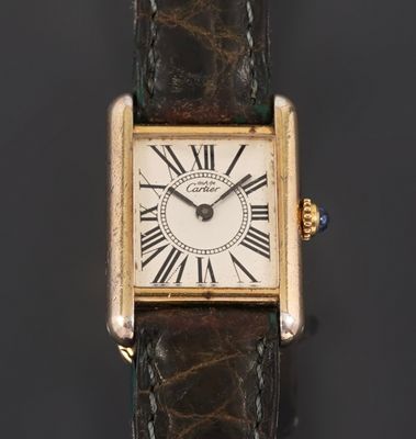 an old watch with roman numerals on the face