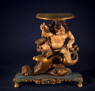 l'image d'une statue d'un homme avec un chapeau sur la tête