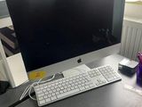 an image of a desk with a computer monitor and keyboard