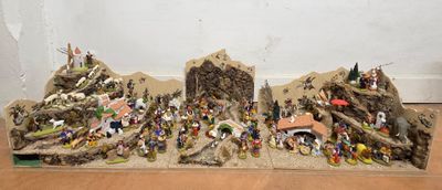 a lot of figurines that are sitting on the floor