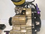 a picture of a small engine with a blue top