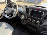 the interior of a vehicle with a steering wheel and dashboard