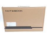 a cardboard box with a note book on top of it