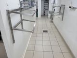 an image of a commercial kitchen with stainless steel sinks