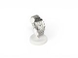 an image of a watch on a stand on a white surface