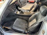 a picture of the interior of a car in a garage