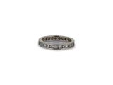 a close up of a ring with diamonds on a white background