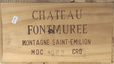 une boîte en bois sur laquelle est accrochée une pancarte indiquant « Château Fontumee »