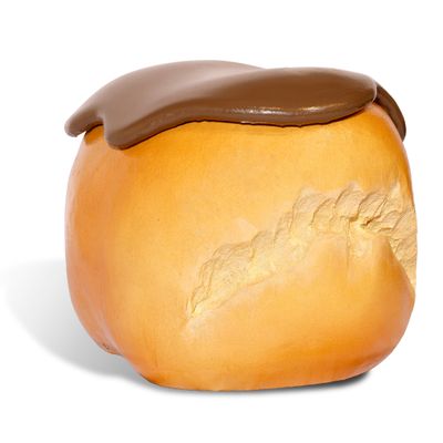 un gros plan sur un morceau de pain recouvert de chocolat