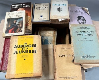 many books that are stacked on top of each other