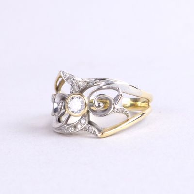 an image of a diamond ring on a white surface